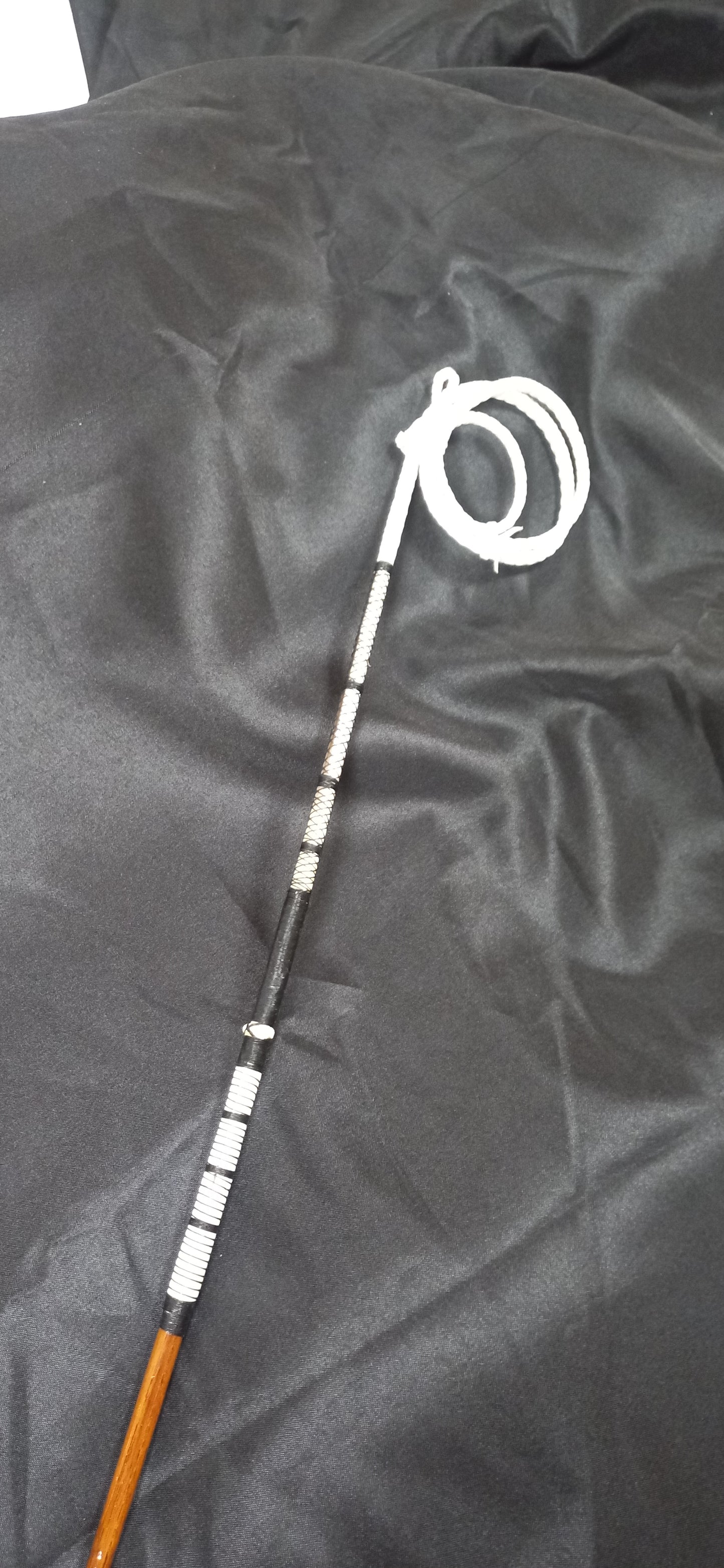 (A) Single Heavily Knotted Plain Butt Piece Whip with Brass Mounting Made by Richard Nicoll - 54" Stick
