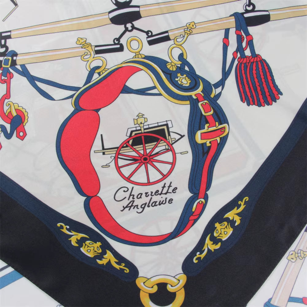 Detail of a saddle design on black silk scarf.