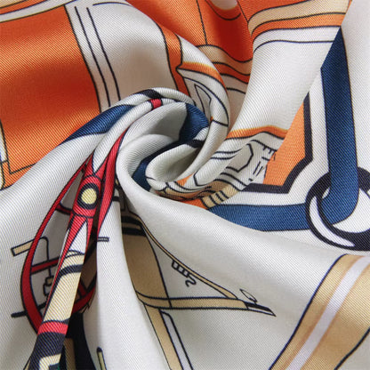Detail of a rolled up silk scarf.